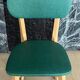 Paire de chaises vintage skaï vert pieds compas