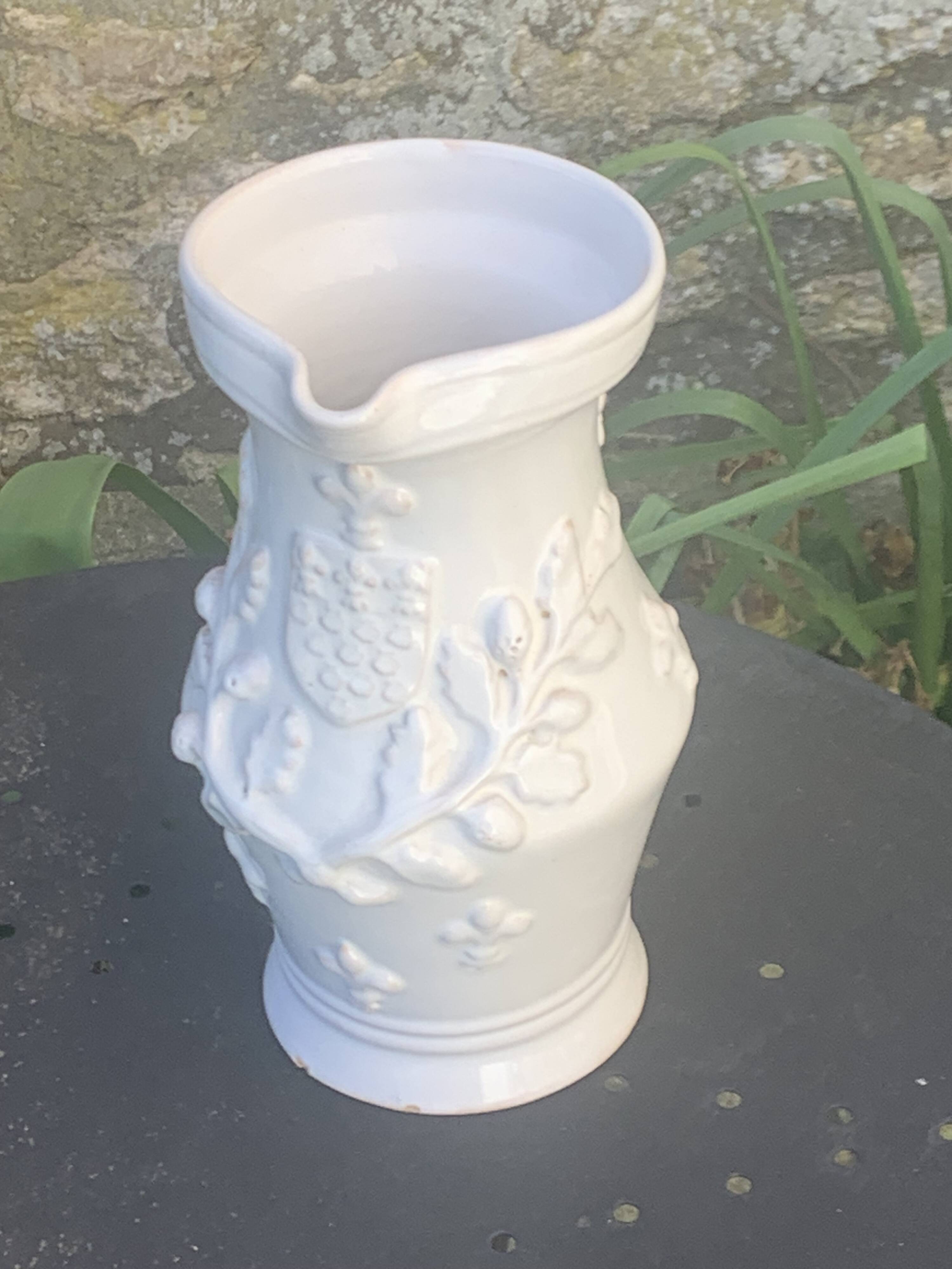 Carafe, pitcher signed Émile Tessier, Old France, in slip, ceramic