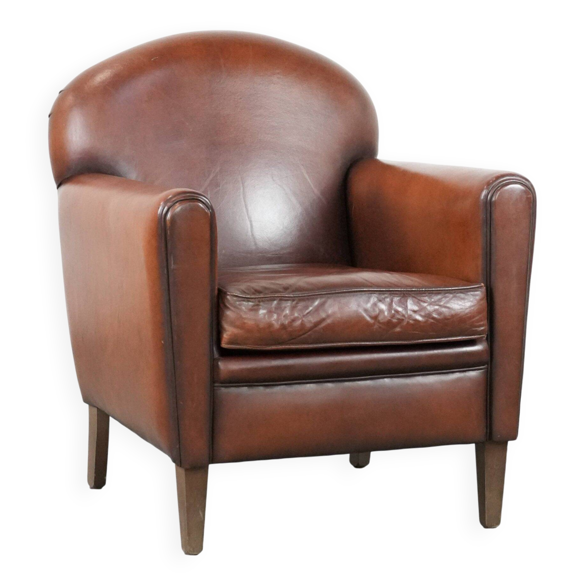 Sheepskin art deco design armchair with timeless and warm colours