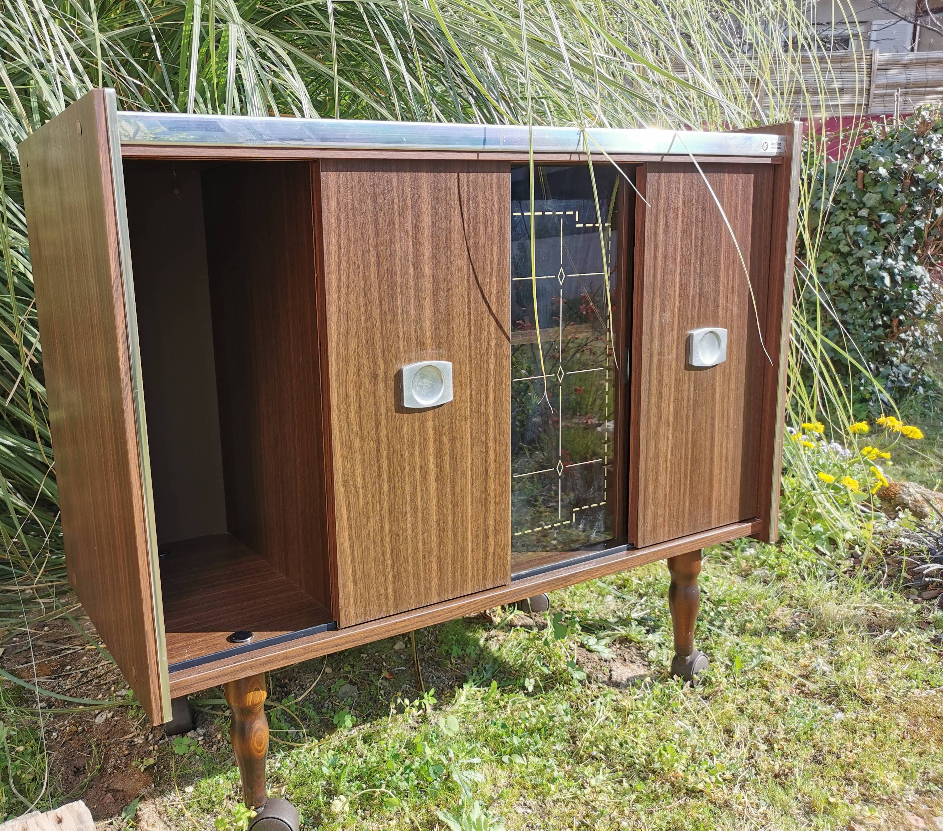 Furniture bar showcase with vintage wheels