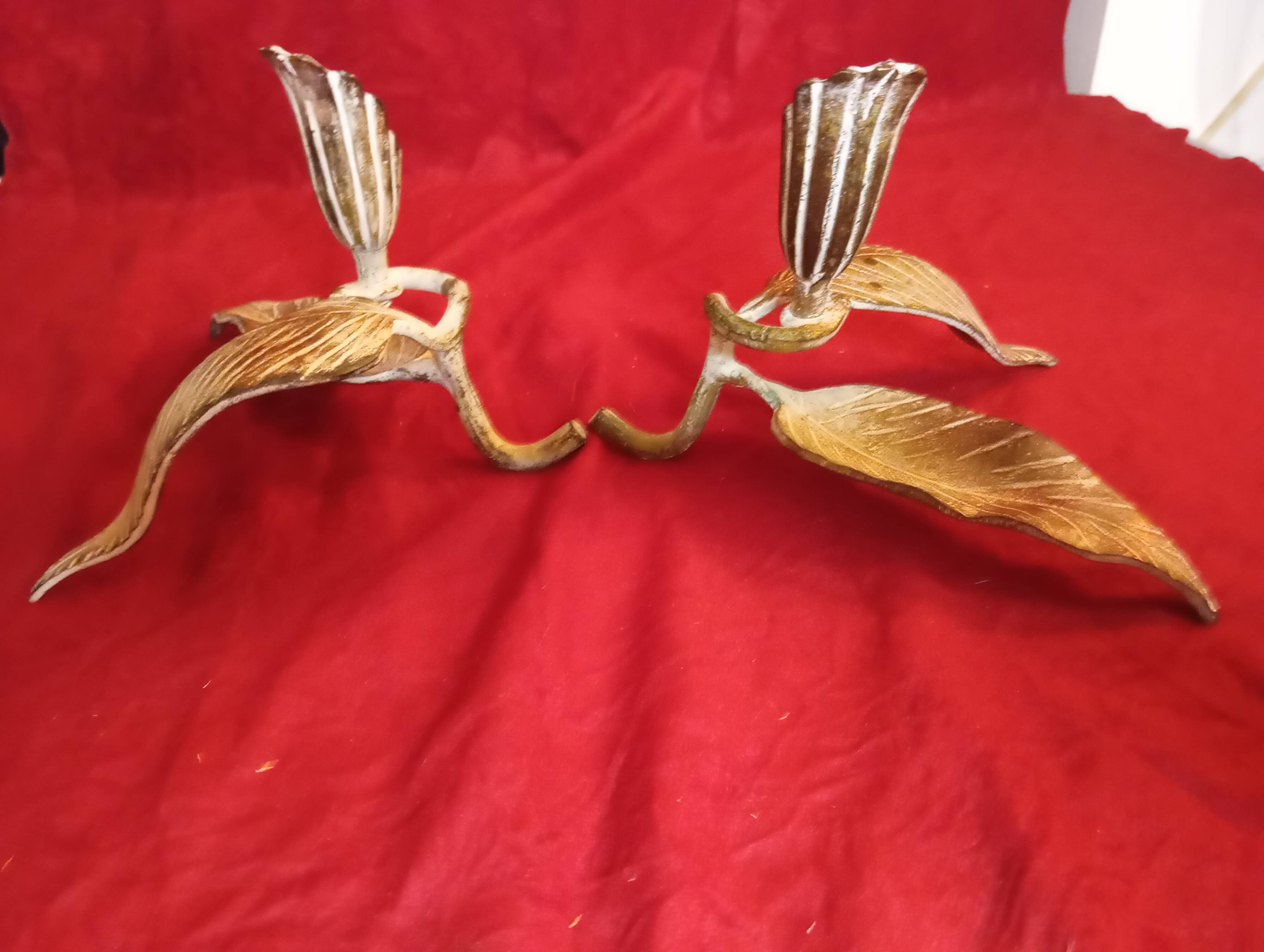 Pair of patina metal candle holders