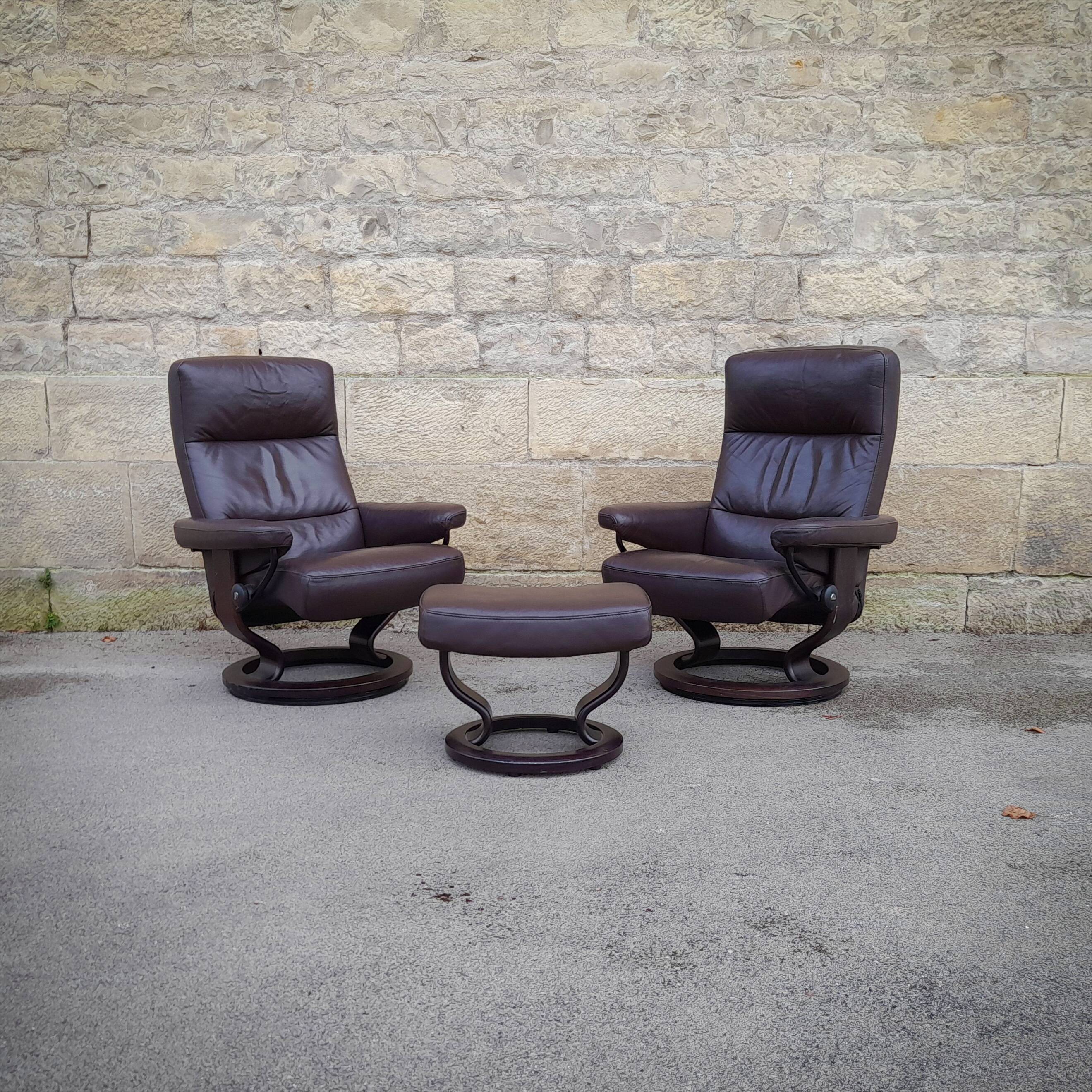 Pair of Scandinavian leather armchairs and ottoman, Ekornes, Norway, 1970s