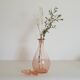Bouteille en verre rose