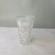 Elegant cut crystal vase in transparent Art Deco style.