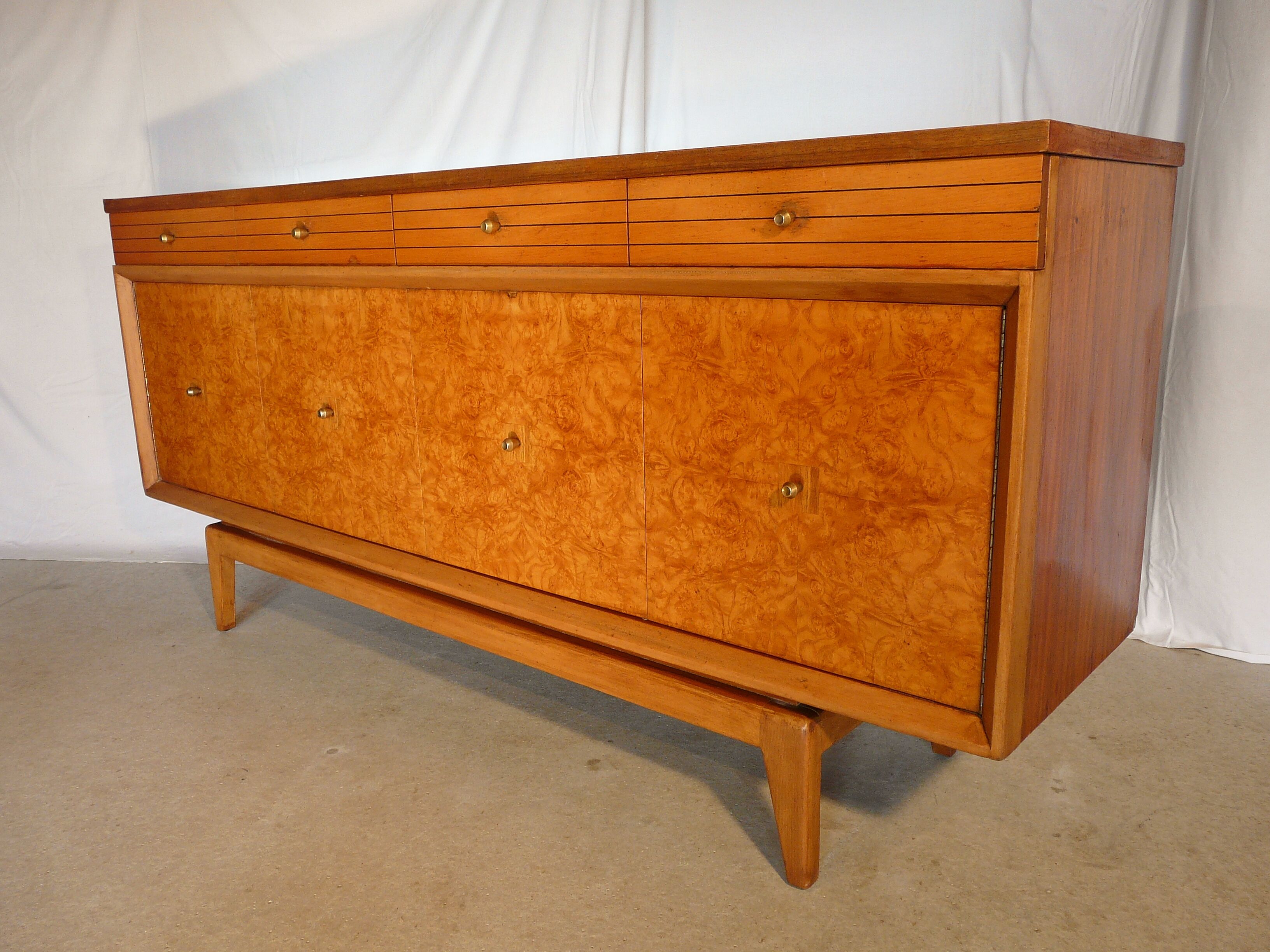 Scandinavian sideboard of blond wood and teak