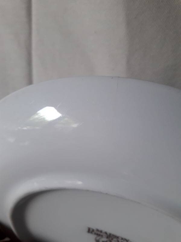 White porcelain drainer and dish