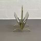 Vintage magazine rack in smoked glass and brass.