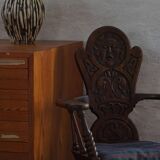 Scandinavian armchair in solid oak with cushion, folk art, early 19th century.