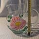 Decorative jug with floral pattern