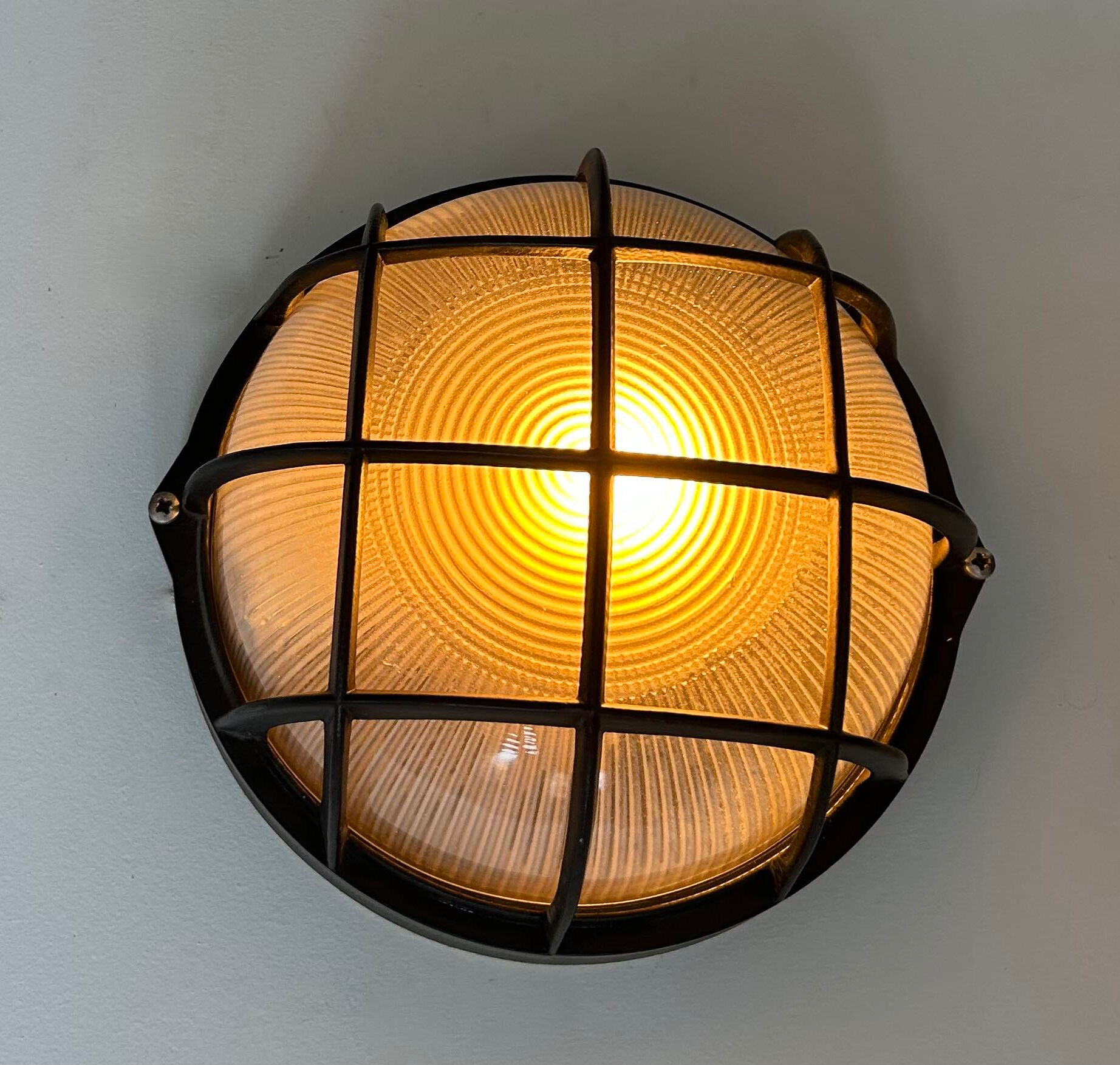 Vintage wall lamp, black metal and ridged glass, France 1980.