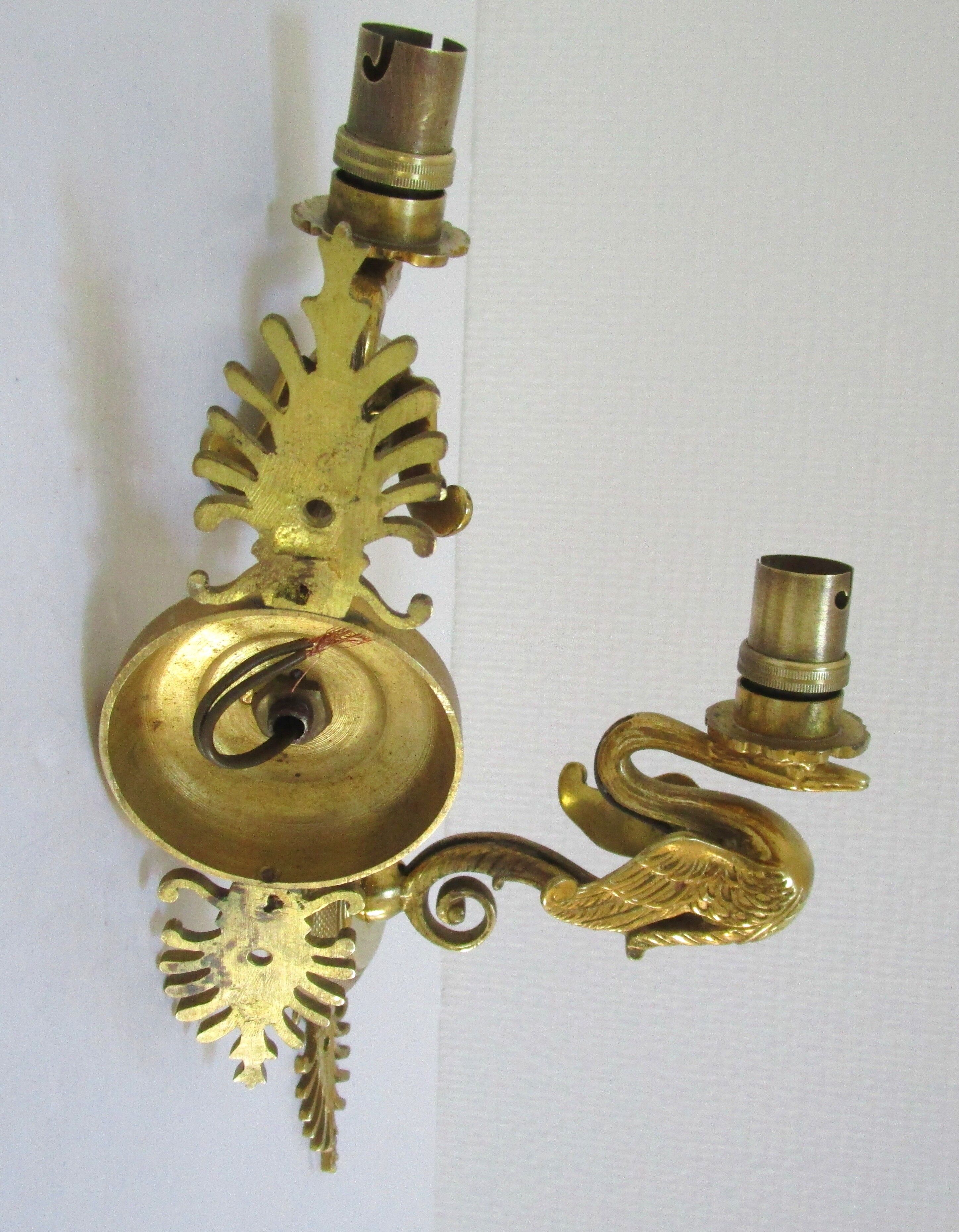Pair of appliques swans gilded bronze patinated empire style