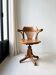Antique wooden swivel chair
