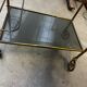 Vintage 70s serving trolley in gold metal and smoked glass