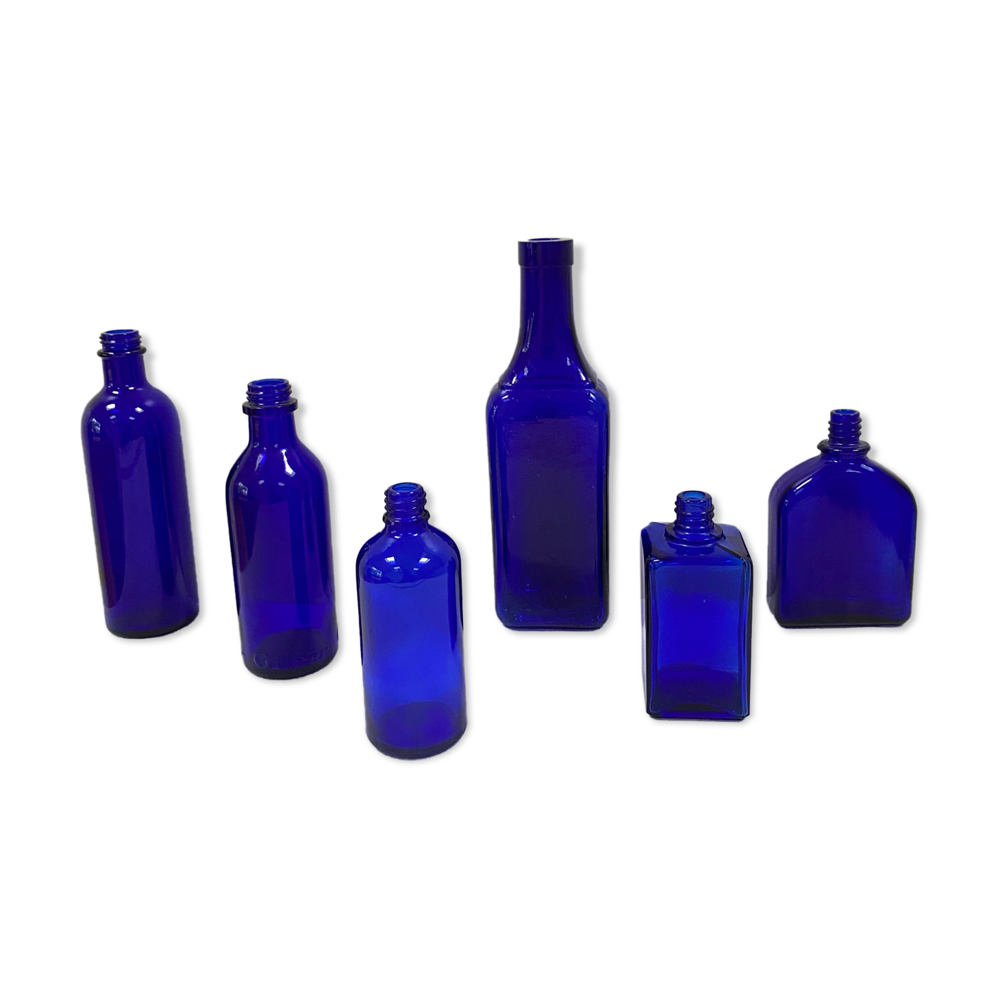 Set of 6 cobalt blue glass pharmacy bottles