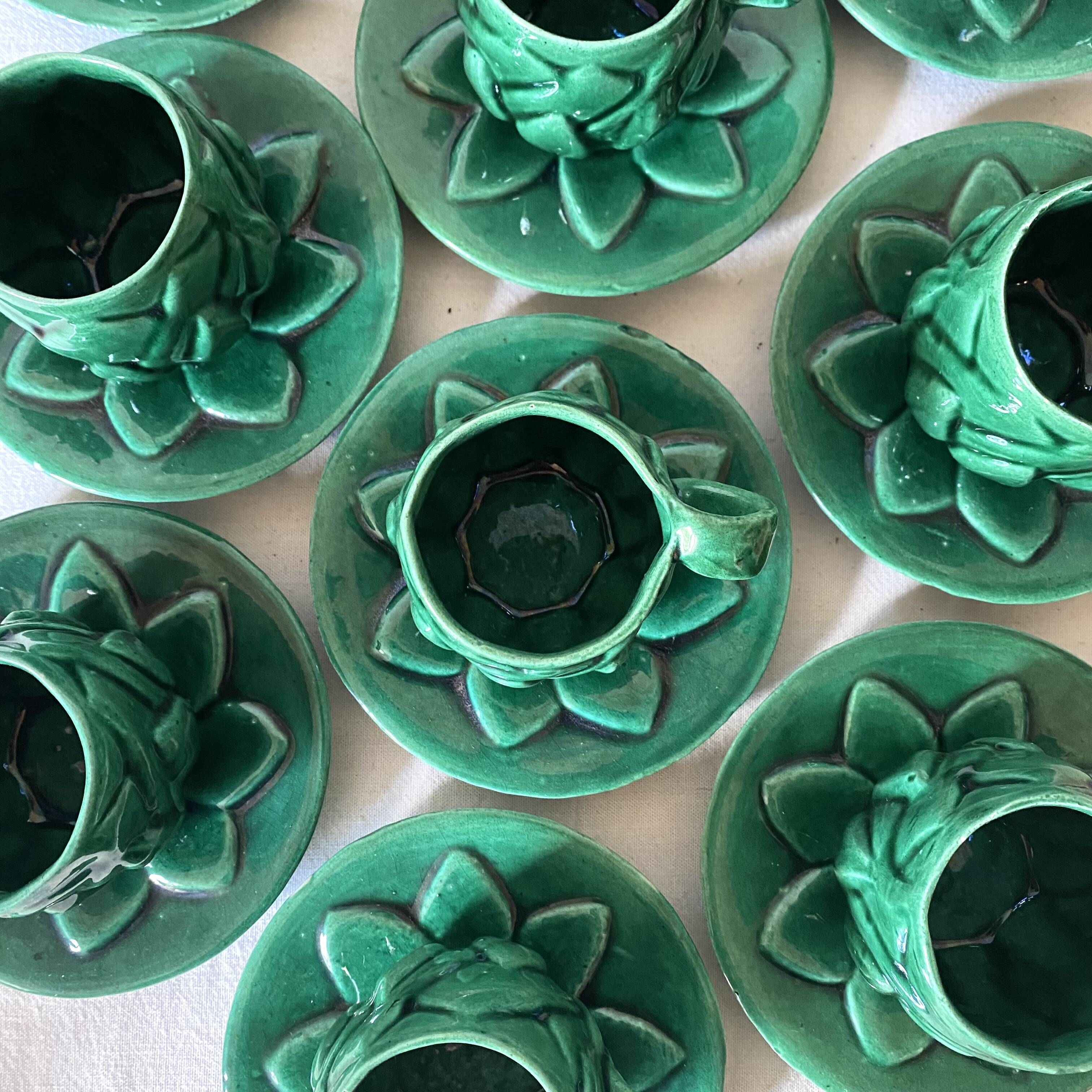 Antique slip cups with saucers, sugar bowl and milk pitcher