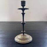 Chiseled brass candle holder