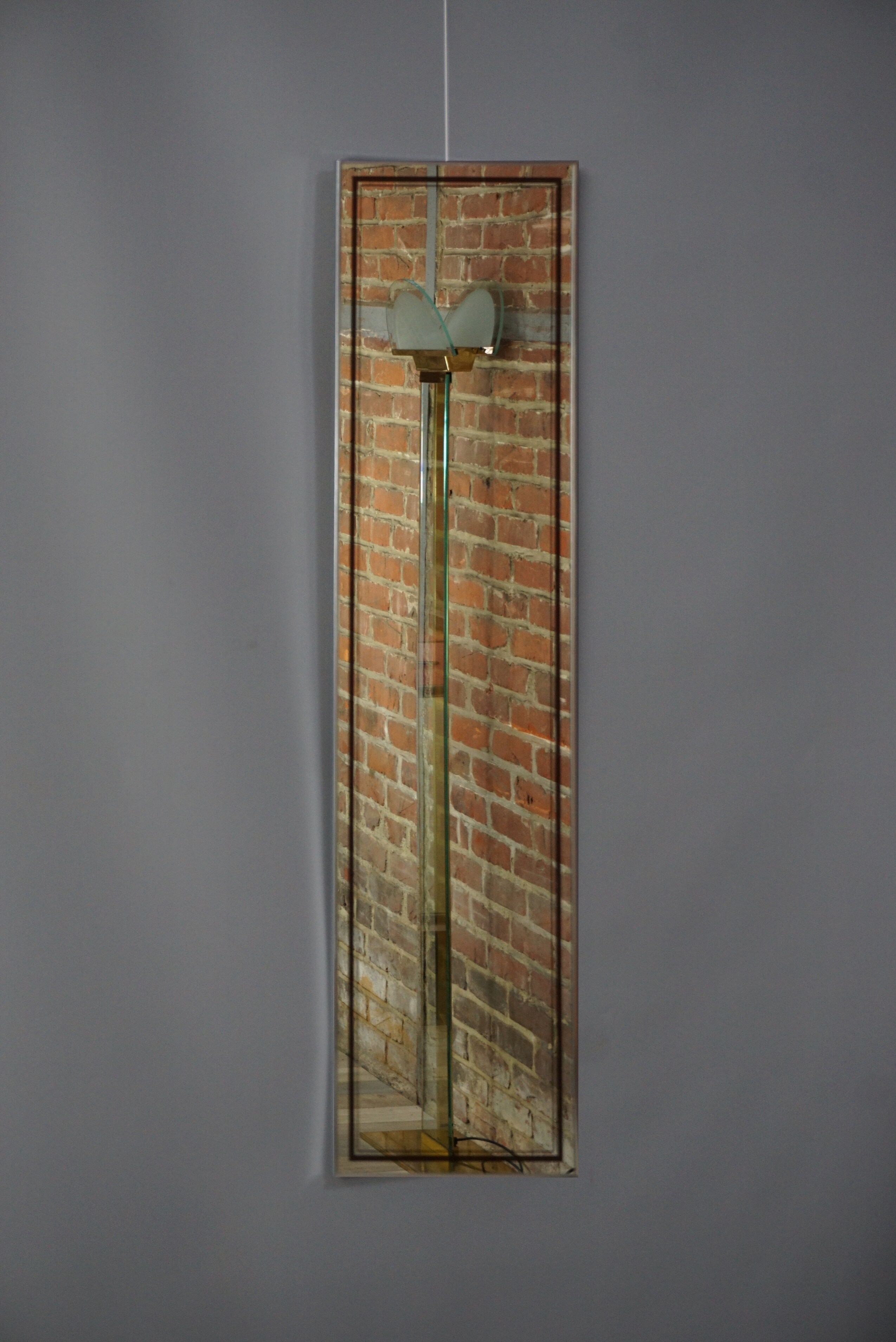 Chrome and screen-printed Deknudt mirror