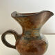 Patinated stoneware jug