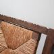 Mid-century rustic wooden armchairs with woven seat and back