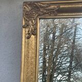 vintage beveled mirror in rectangular shape stucco and gilded wood in Louis XV baroque style