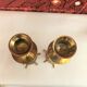 Pair of gilded brass candlesticks