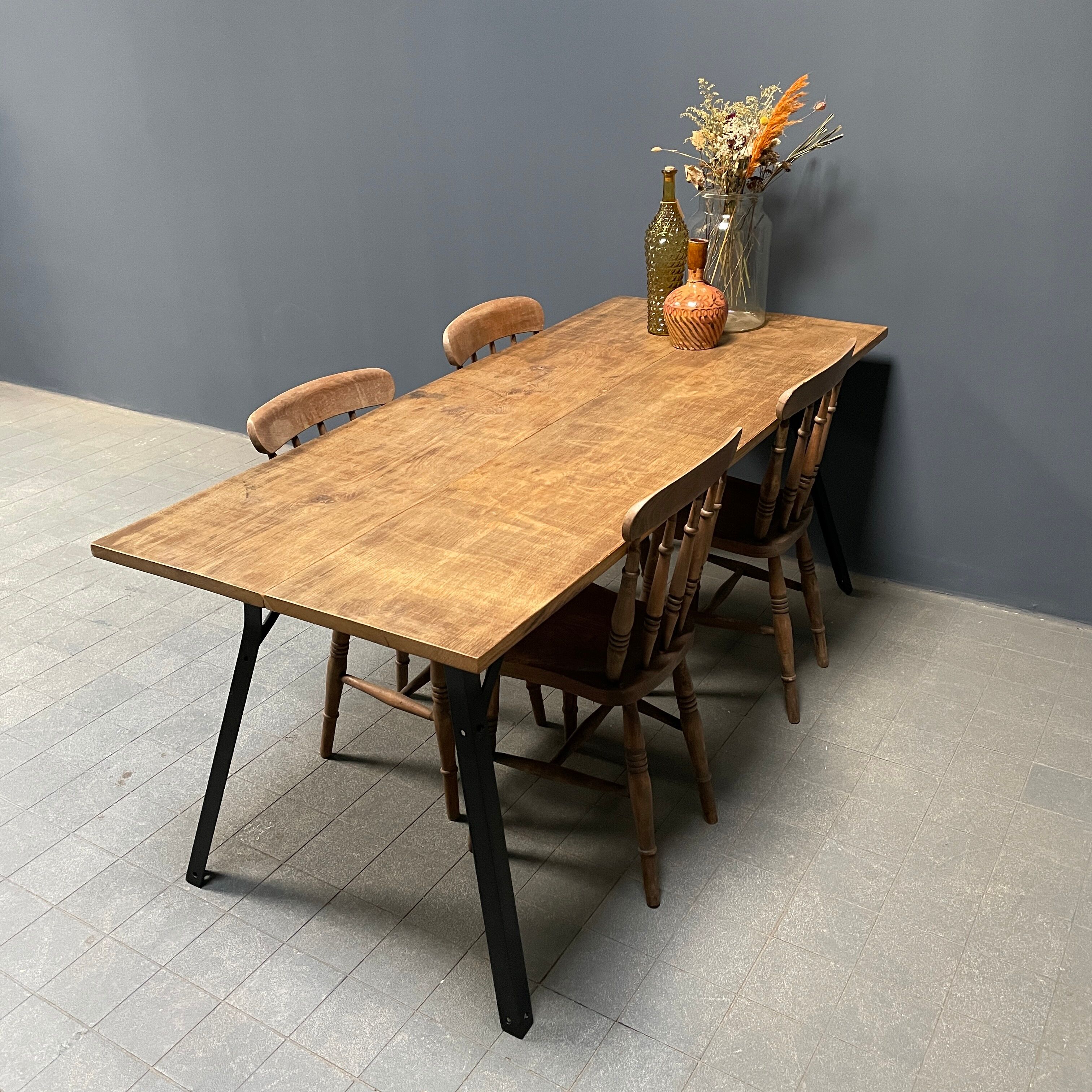 Handmade industrial oak dining table with black metal legs