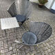 2 cone chairs and a table by Steel-Line