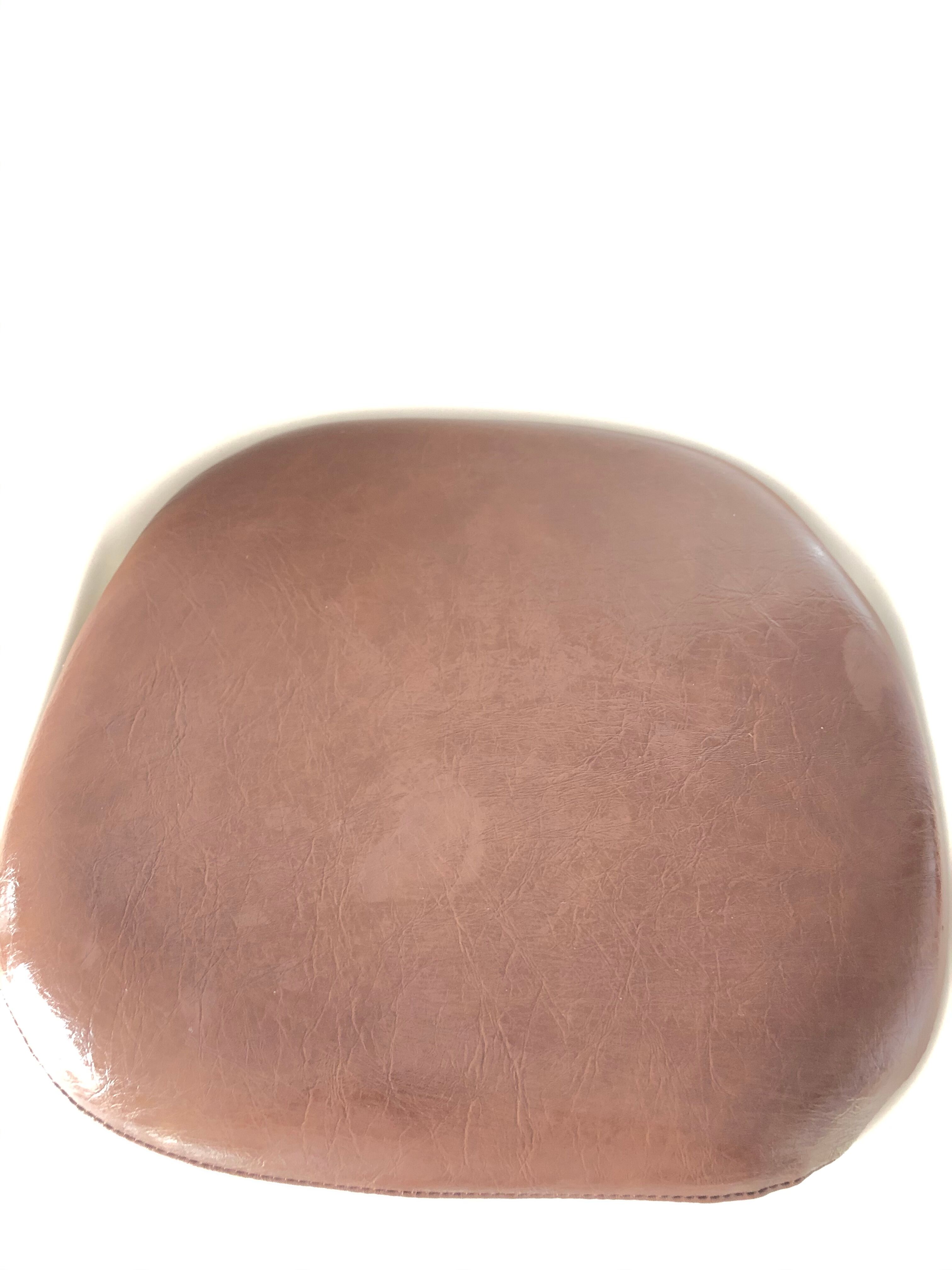 Pair of vintage tulip foot swivel chairs