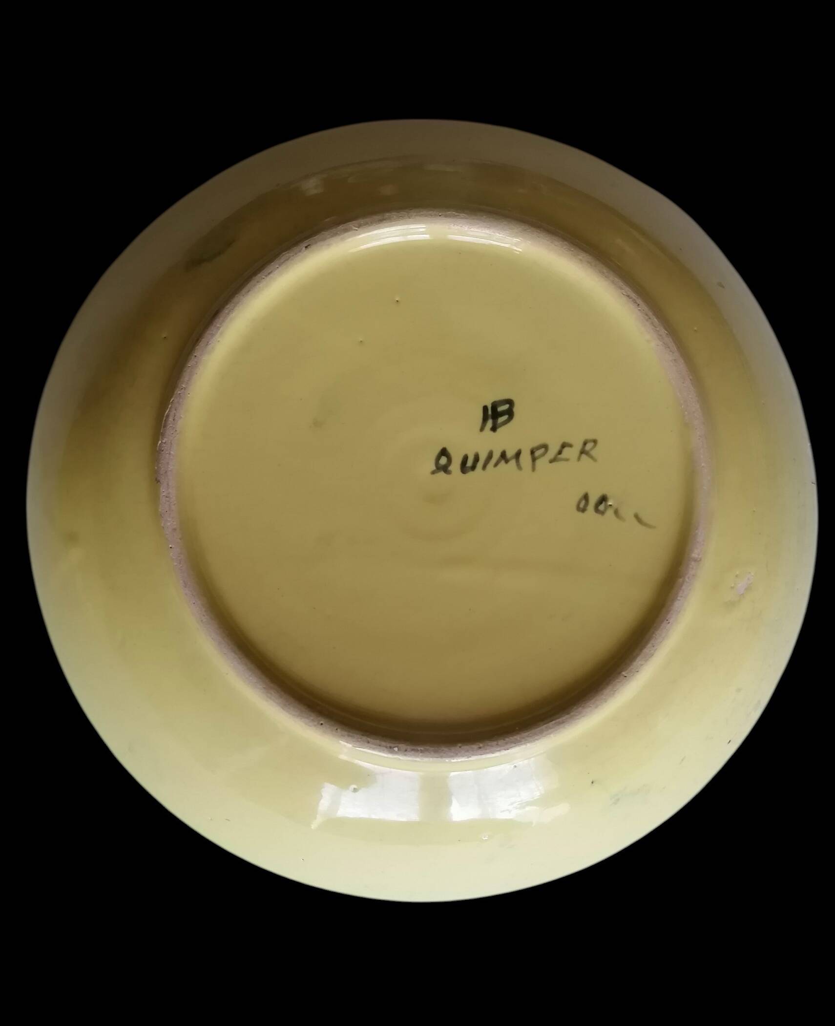 Two plates from the Breton faience HB Quimper.