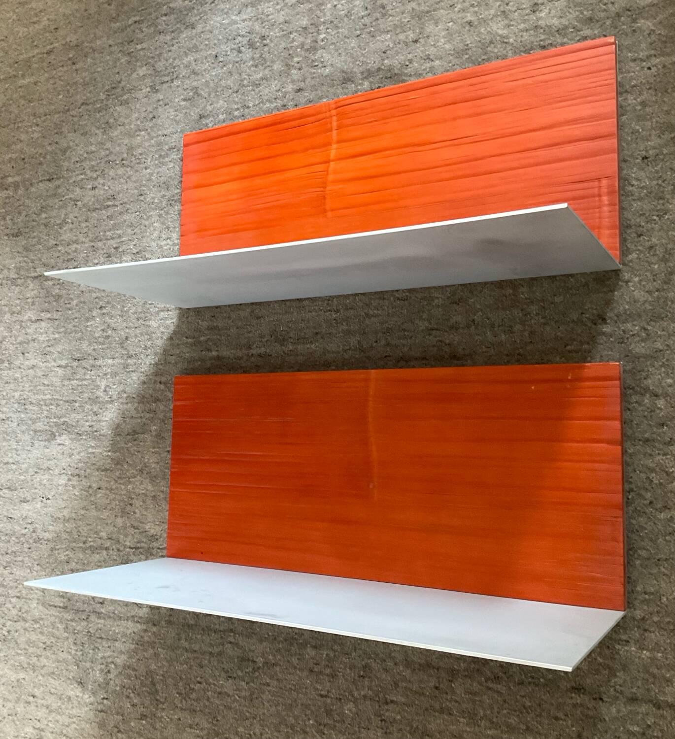 Pair of contemporary wall shelves in steel and stained wood