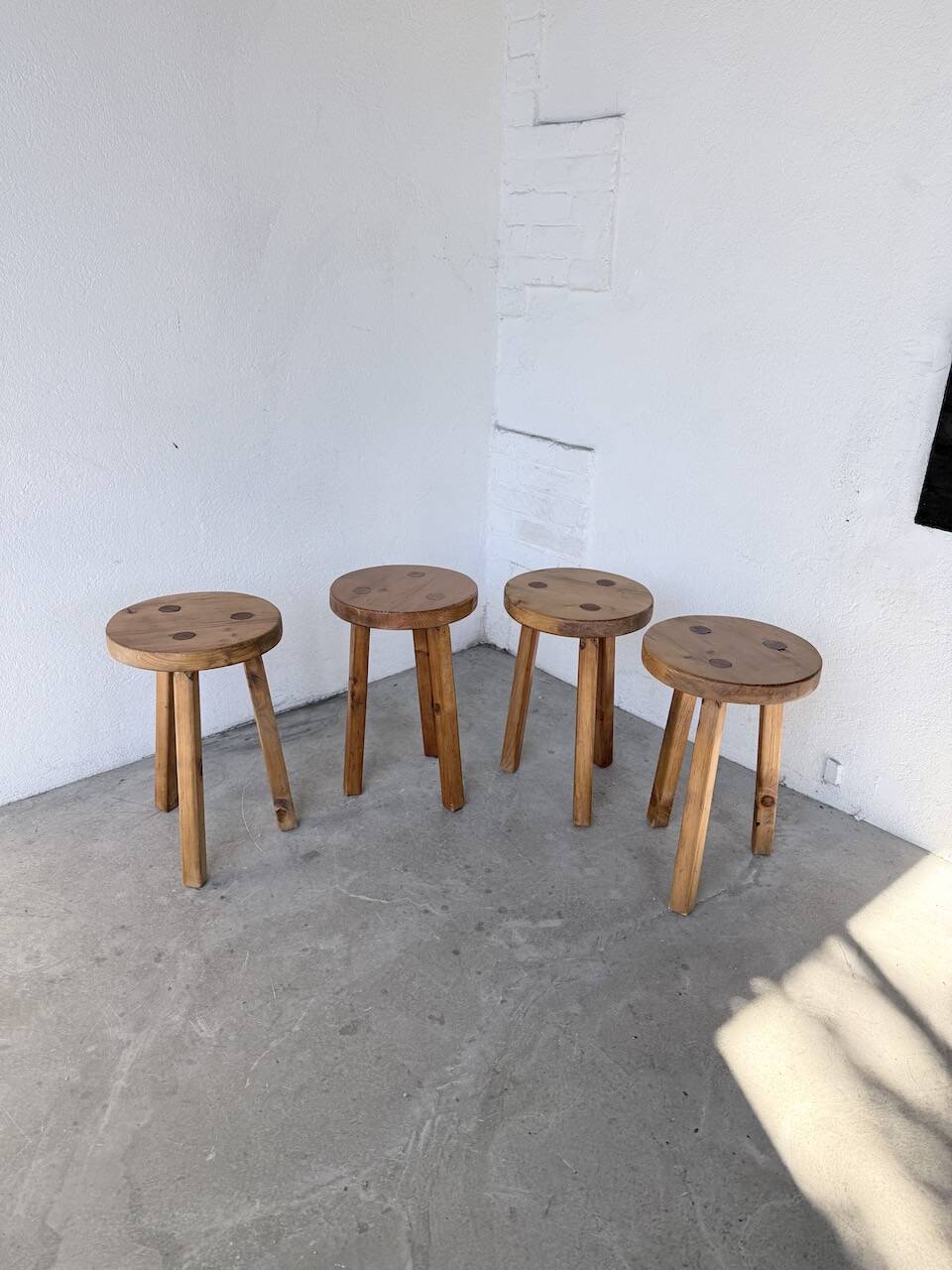 Set of 4 tripod stools from the 1950s.