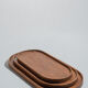 Trio of oval teak trays or cups