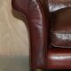 Vintage Art Deco leather sofa, three-seater, feather cushions.