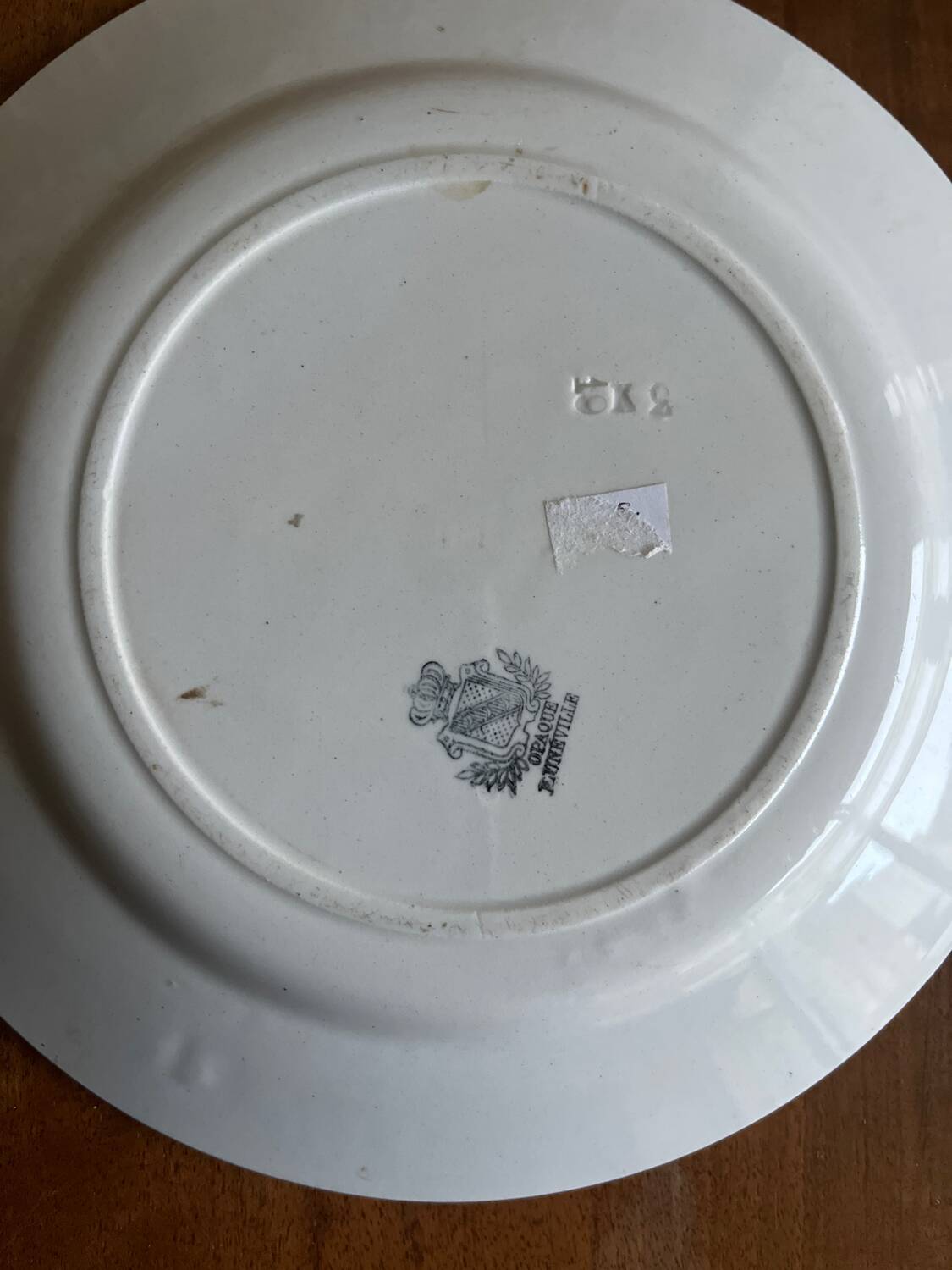 Assiette à l oiseau et panier fleuri . Luneville