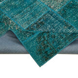 Handmade anatolian vintage 170 cm x 241 cm turquoise patchwork carpet