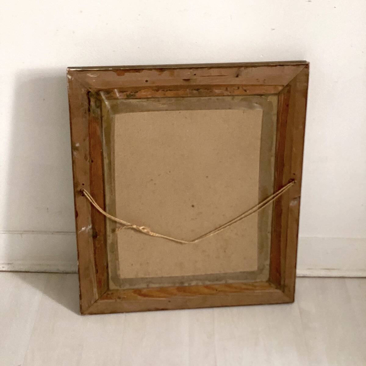 Small wooden mirror with gilded stucco in the Louis XVI style.