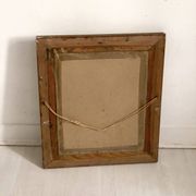 Small wooden mirror with gilded stucco in the Louis XVI style.