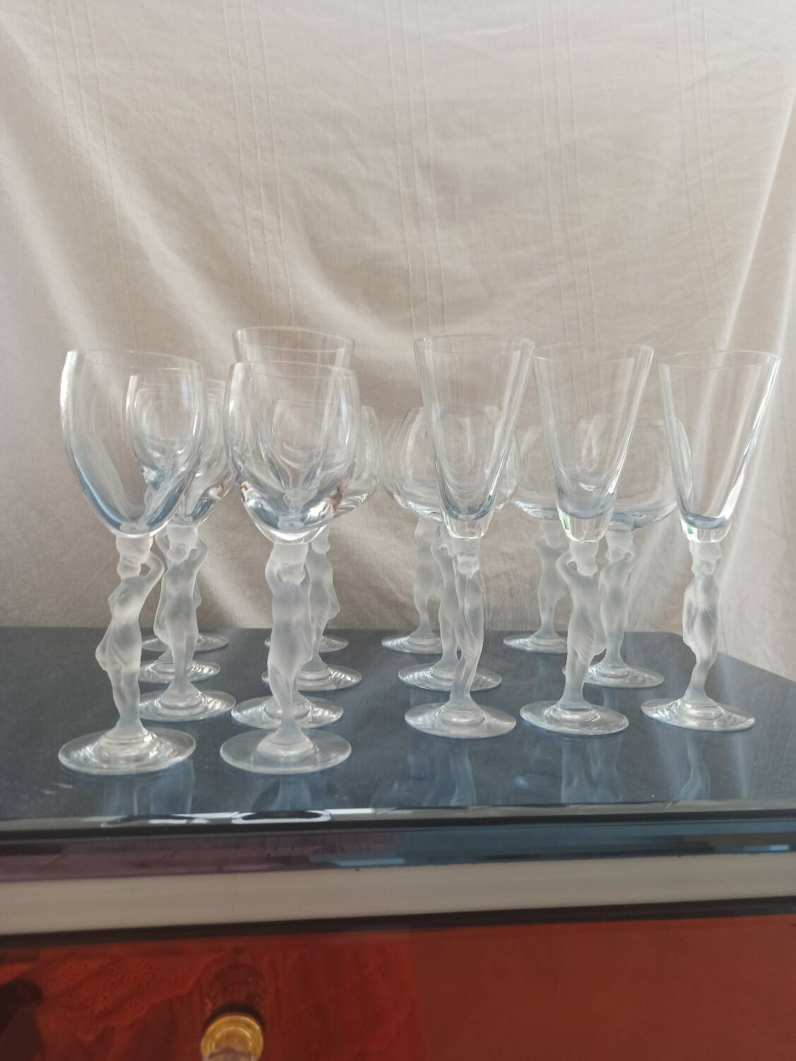15 art deco glasses in French crystal with caryatid base