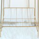 Side table in gilded brass