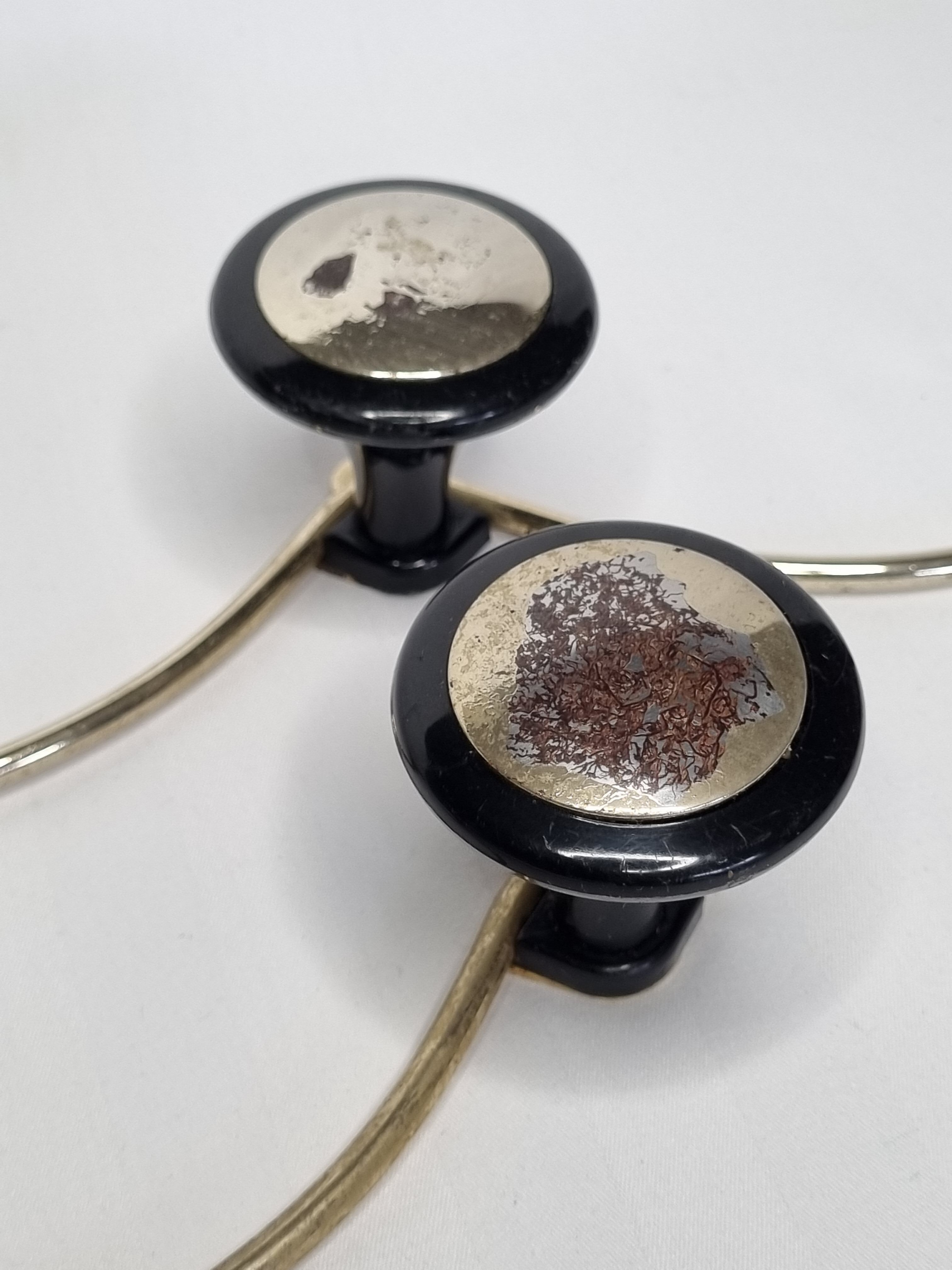 Pair of vintage wall coat racks in gold metal