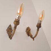 Antique wall lights in gilded brass – Louis XV style, charm and elegance
