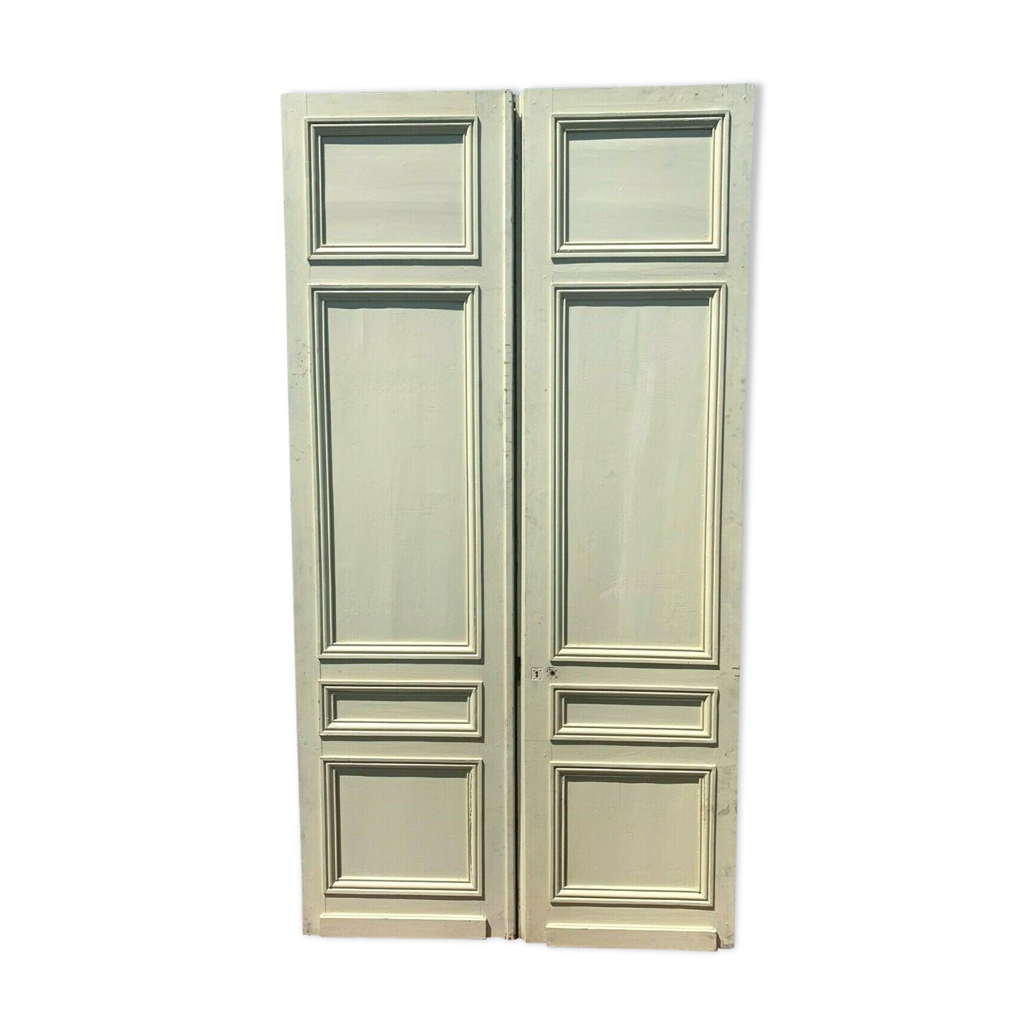 Double passage doors has four molded panels XX century