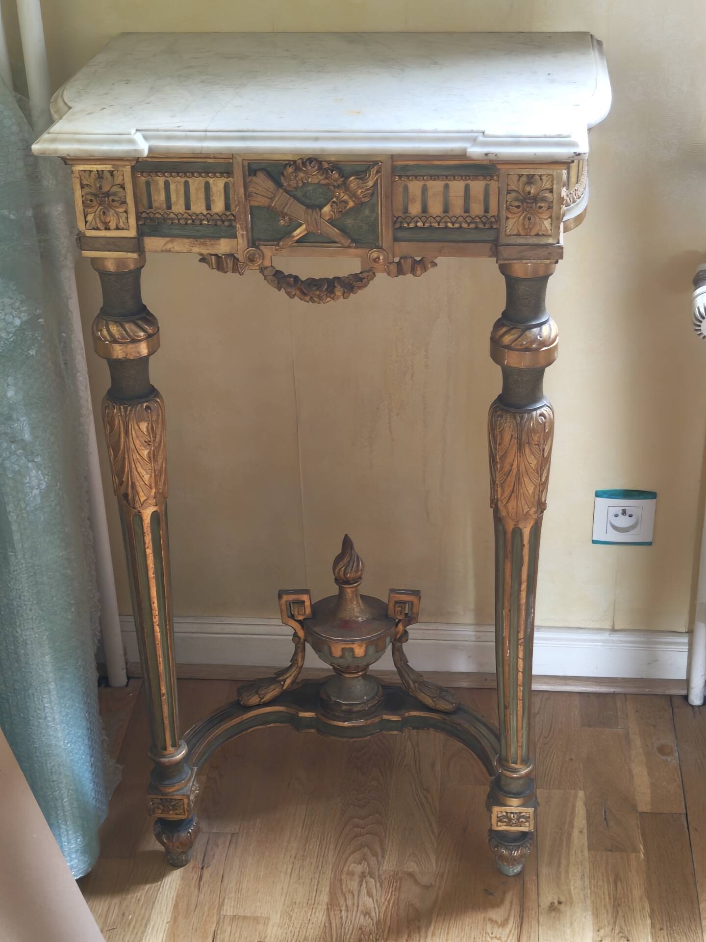 Golden wood and marble console in neoclassical style