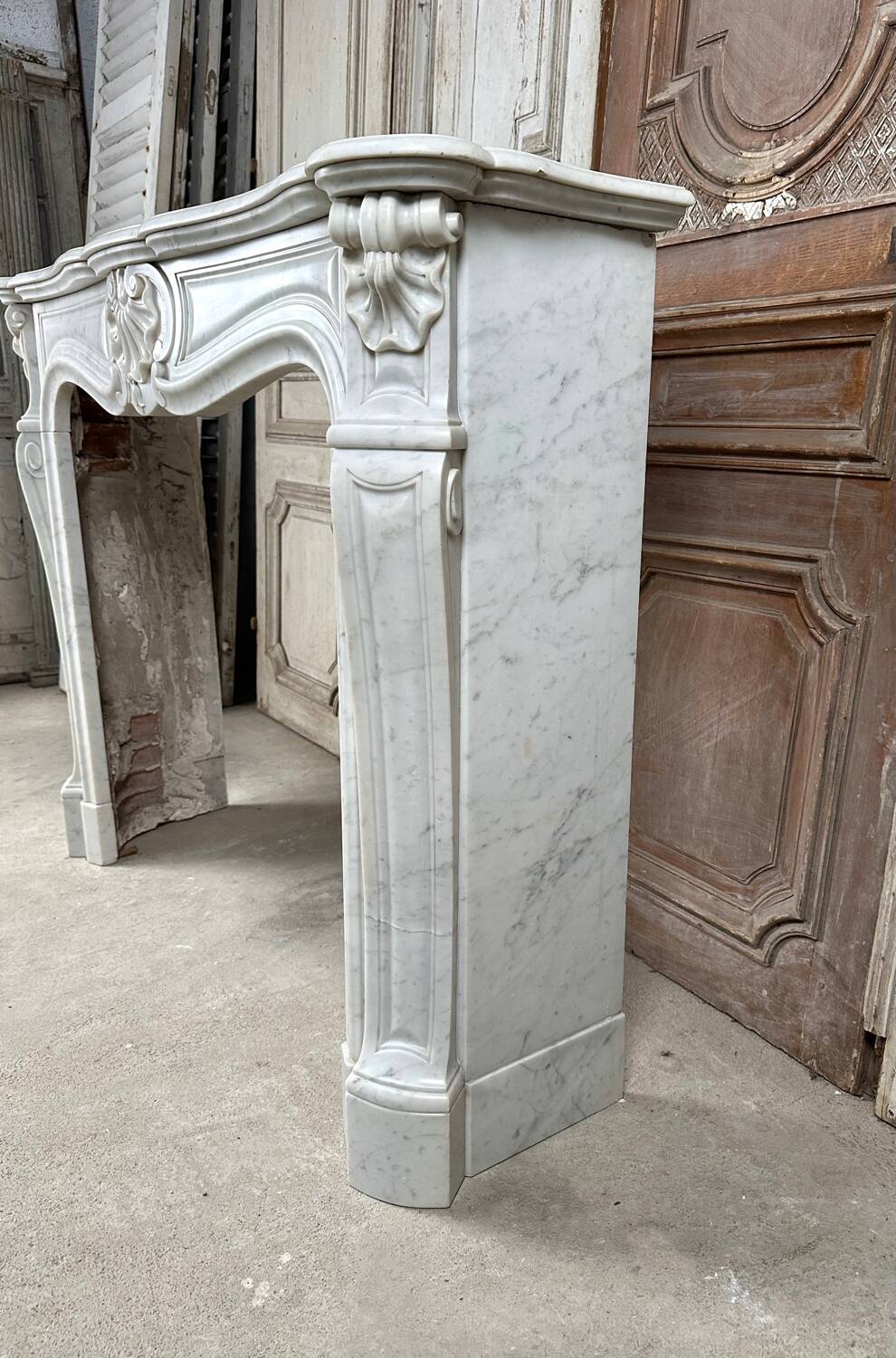 Louis XV style fireplace in white marble