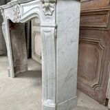 Louis XV style fireplace in white marble