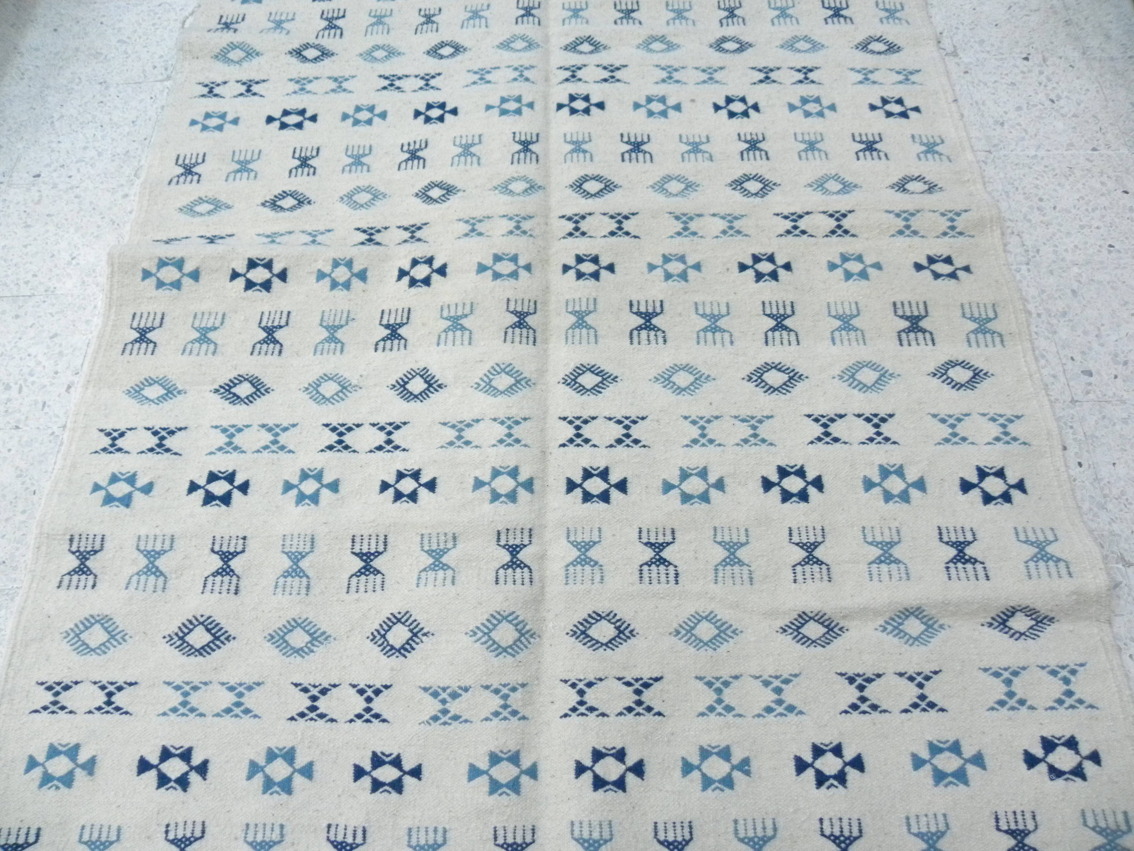 Nomadic Tunisian Berber rug, margoum kilim, ethnic in beige and blue wool.