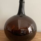 Old amber demijohn