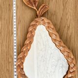 Pear-shaped woven wicker mirror
