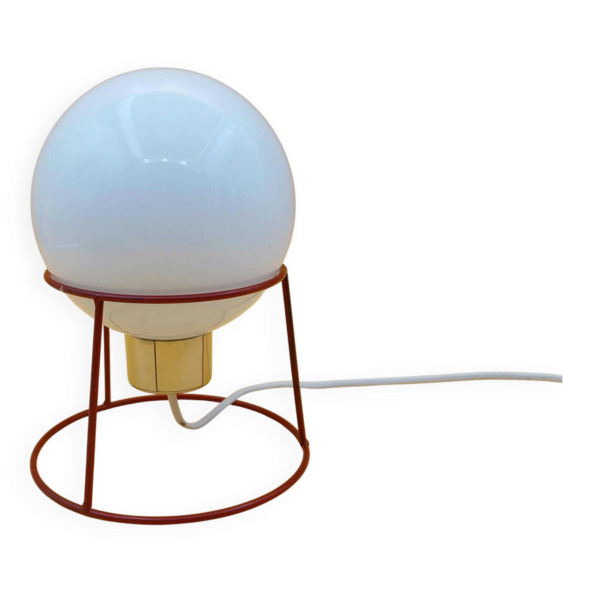 Red metal lamp with opaline globe from the 70s and 80s.