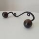Wood and wrought iron ball coat rack from the 1950s.